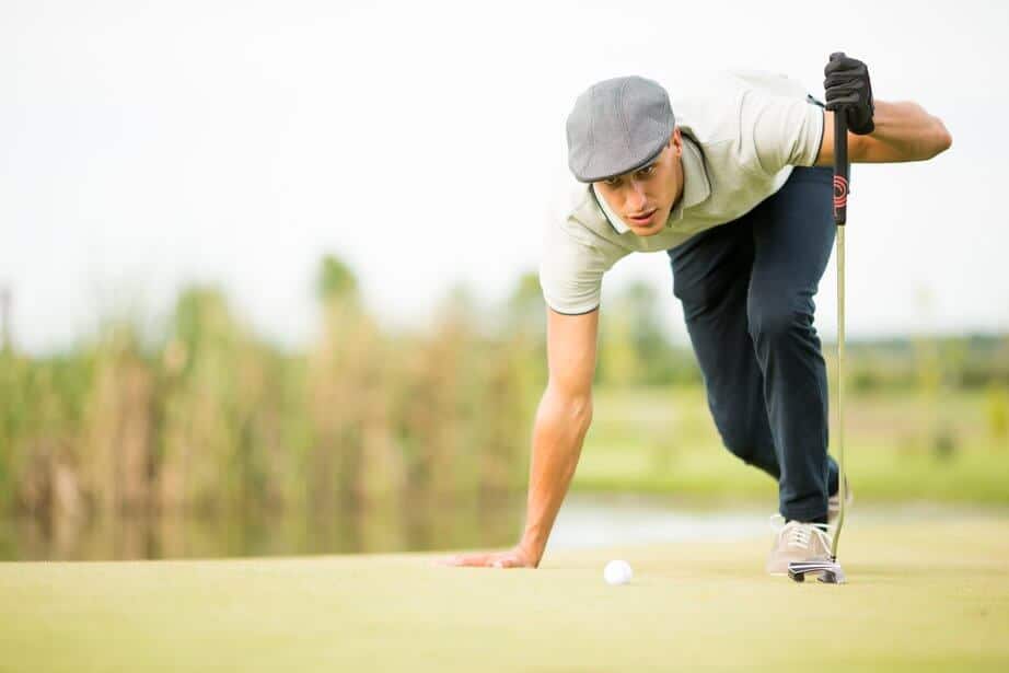Golfer measuring distance