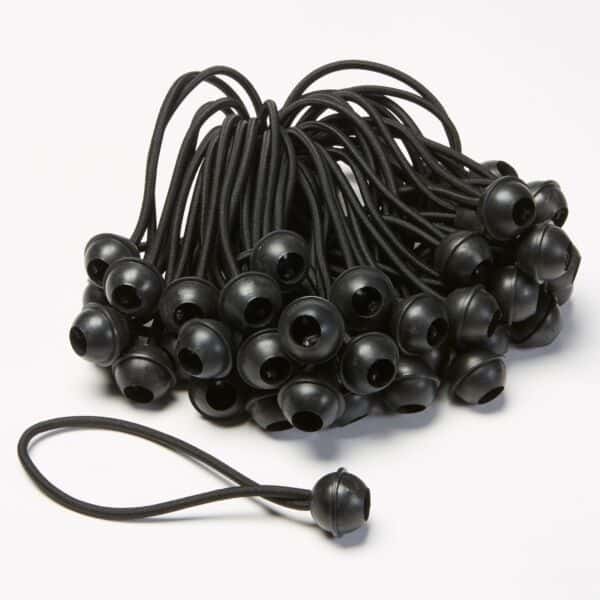 A set of ball bungees on a white surface