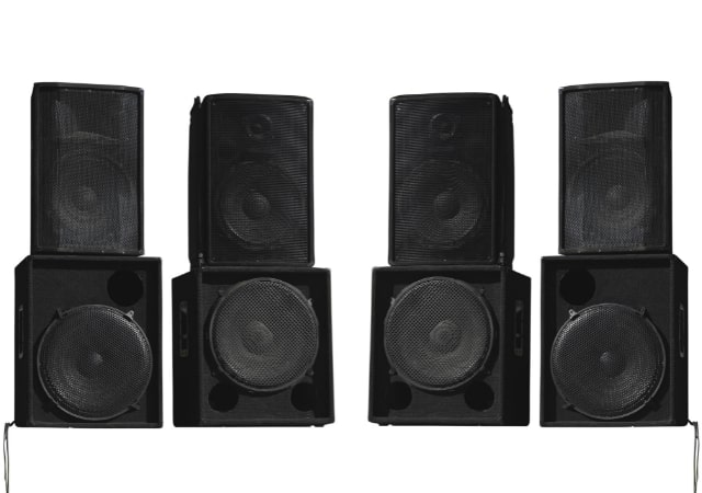 Four stereo speakers on white background