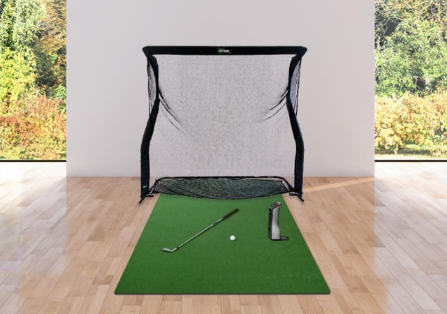 Indoor set up of the Foresight Sports GCQuad Home Golf Simulator Package