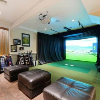 HD Golf Simulator Package complete indoor setup with ottomans in the surroundings