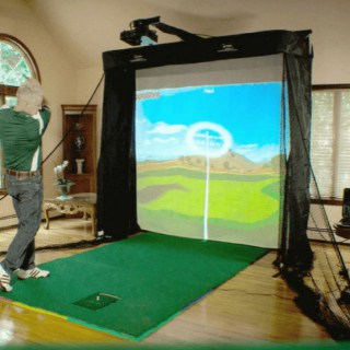 Optishot 2 Golf in A Box Series complete indoor setup with a golfer using it