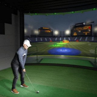 A golfer using one of HD Golf's simulation package setups