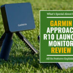 Garmin Approach R10 Launch Monitor on top of grass with smartphone beside it. Green textbox on the right contains the text "What's Special About It? Garmin Approach R10 Launch Monitor Review. All Its Features Discussed."
