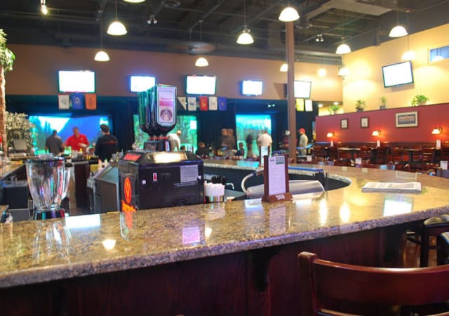 Indoor bar area for food and drinks in a commercial golf simulator place