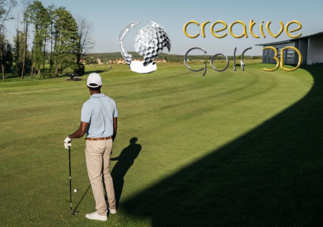 A golfer with his golf club in the golf area background.