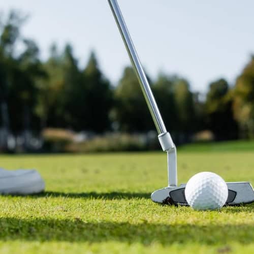 Golf Putting on Green
